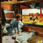 A boy in pajamas looks out the window of his sleeper trani car and sees a real-life cowboy on a horse in front of a western butte.